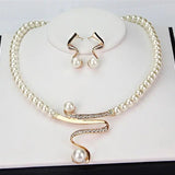 Set of a necklace and earrings with natural pearls