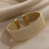 Elegant bracelet made of braided mesh with open design