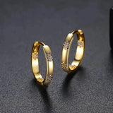 Vintage golden hoops with flowers